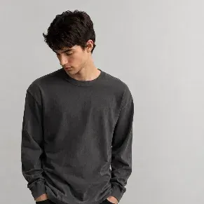 A dark grey longsleeve tee