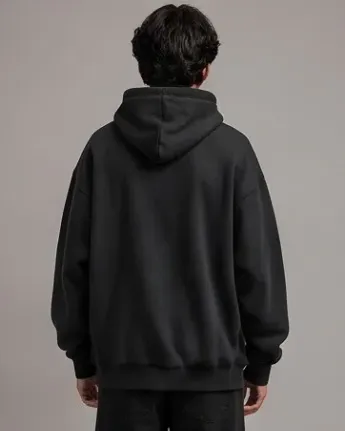 Kombinasi DAE Essential Hoodie warna broken white dengan raw denim santai di Melawai Blok M