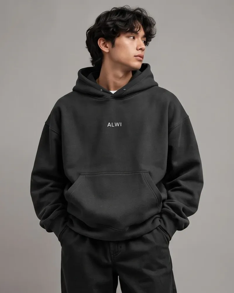 Model wearing charcoal hoodie front view
